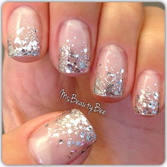 Photo of silver glitter dipped nails 