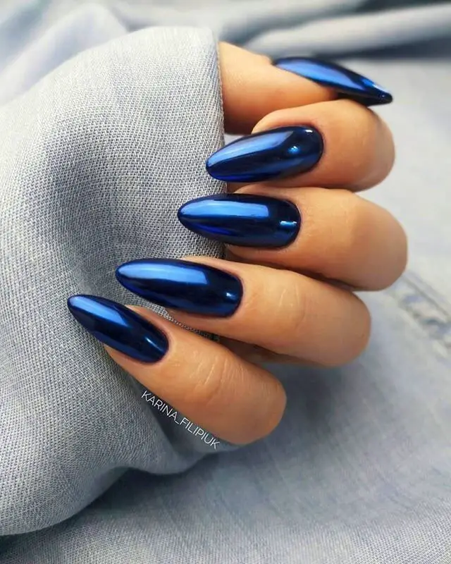 Photo of blue chrome nails