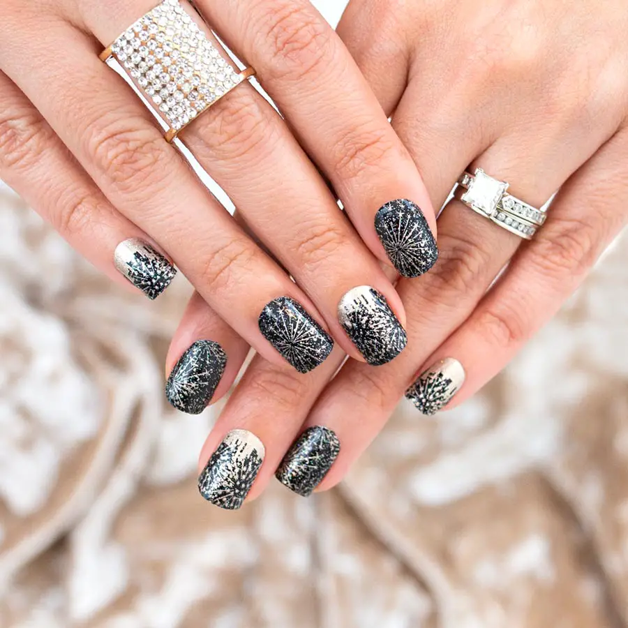 Photo of black nails with silver fireworks by Color Street