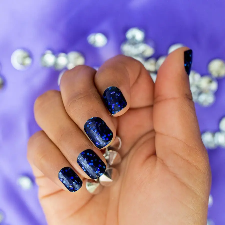 Photo of blue glitter nails by Color Street