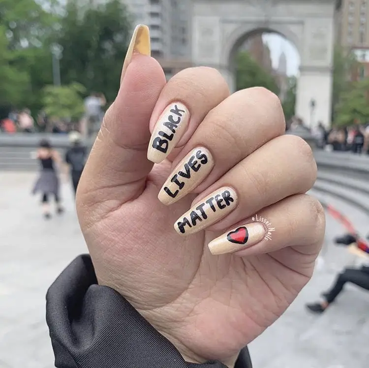 Photo of neutral black lives matter nail art