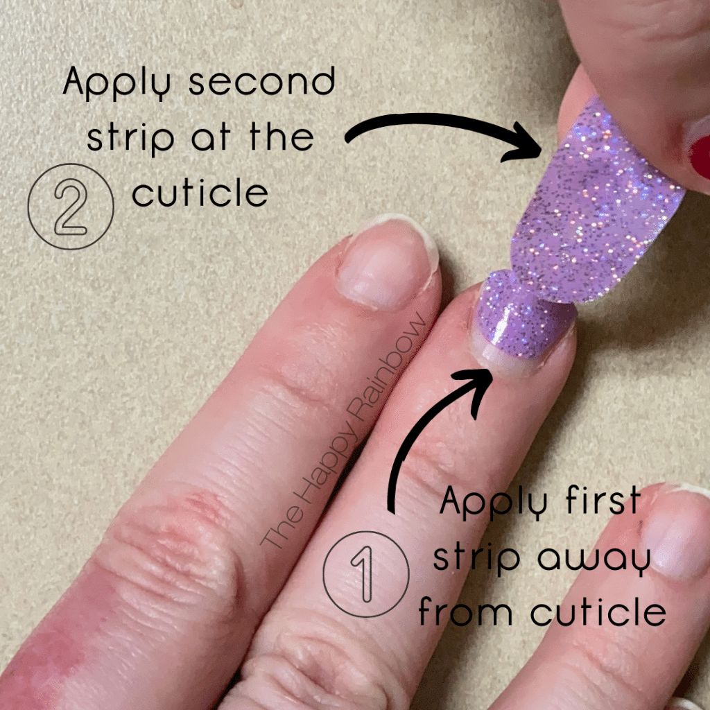 How to prevent hair getting caught under nail strips with proper laying technique.